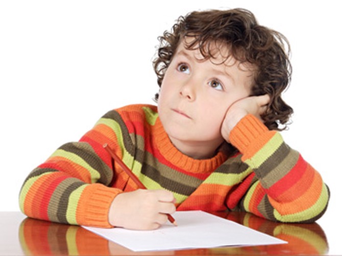 Boy writing letter